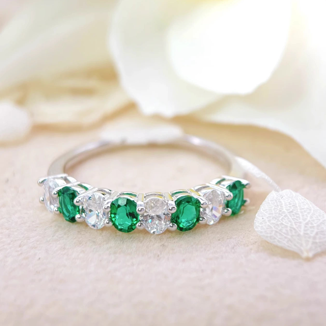 Emerald and White Zircon Eternity Ring