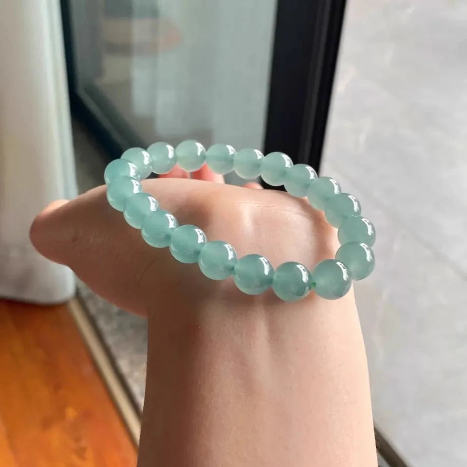 Natural Ice-glassy Jadeite 9.6mm Bead Bracelet with a Blue Base