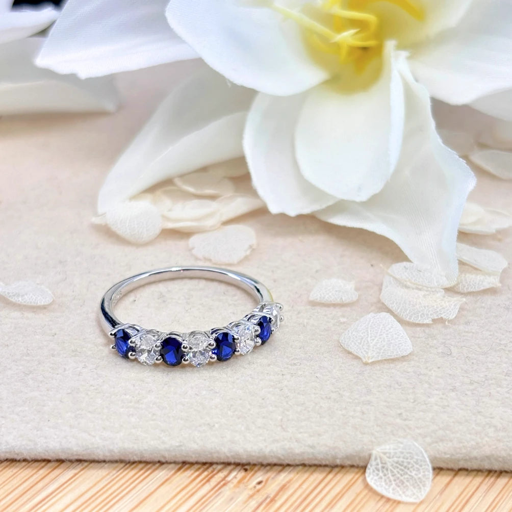 Royal Blue Sapphire and White Zircon Eternity Ring