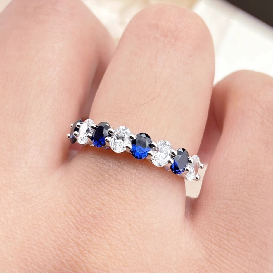 Royal Blue Sapphire and White Zircon Eternity Ring