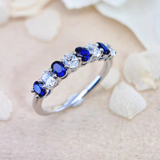 Royal Blue Sapphire and White Zircon Eternity Ring